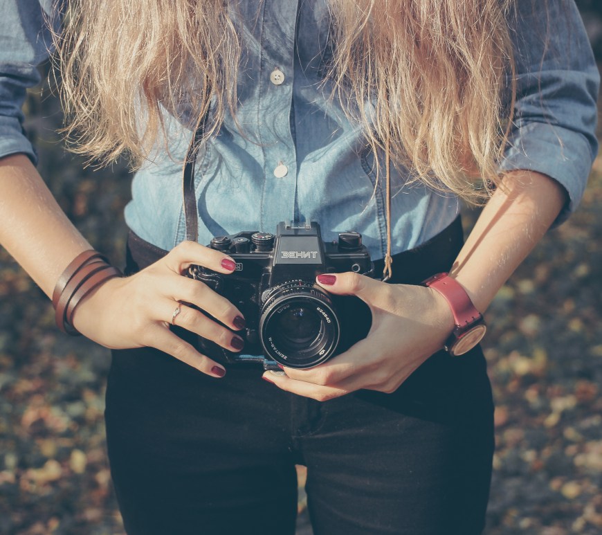 Camera around girl's neck